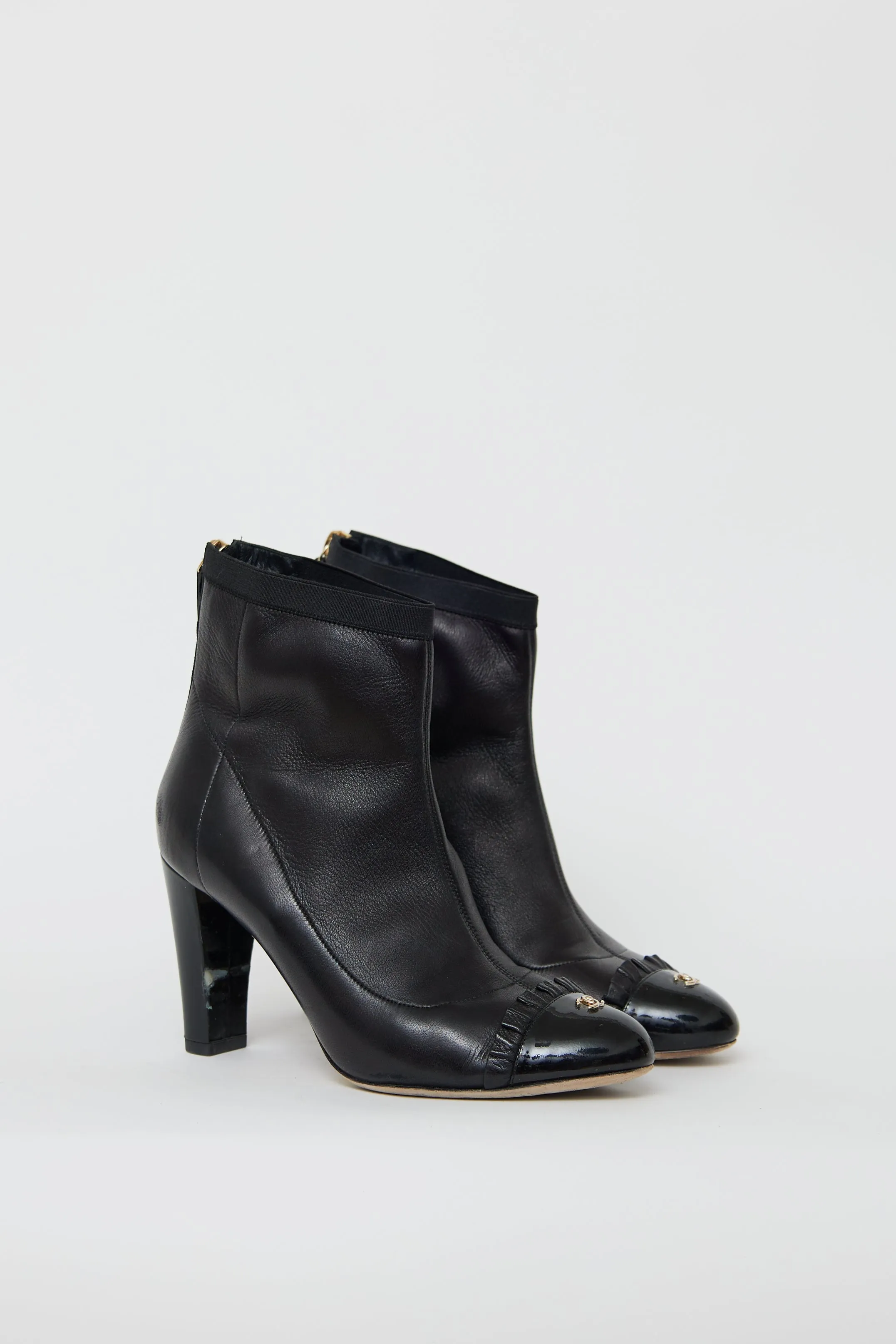 Black Leather Ruffled Ankle Boot