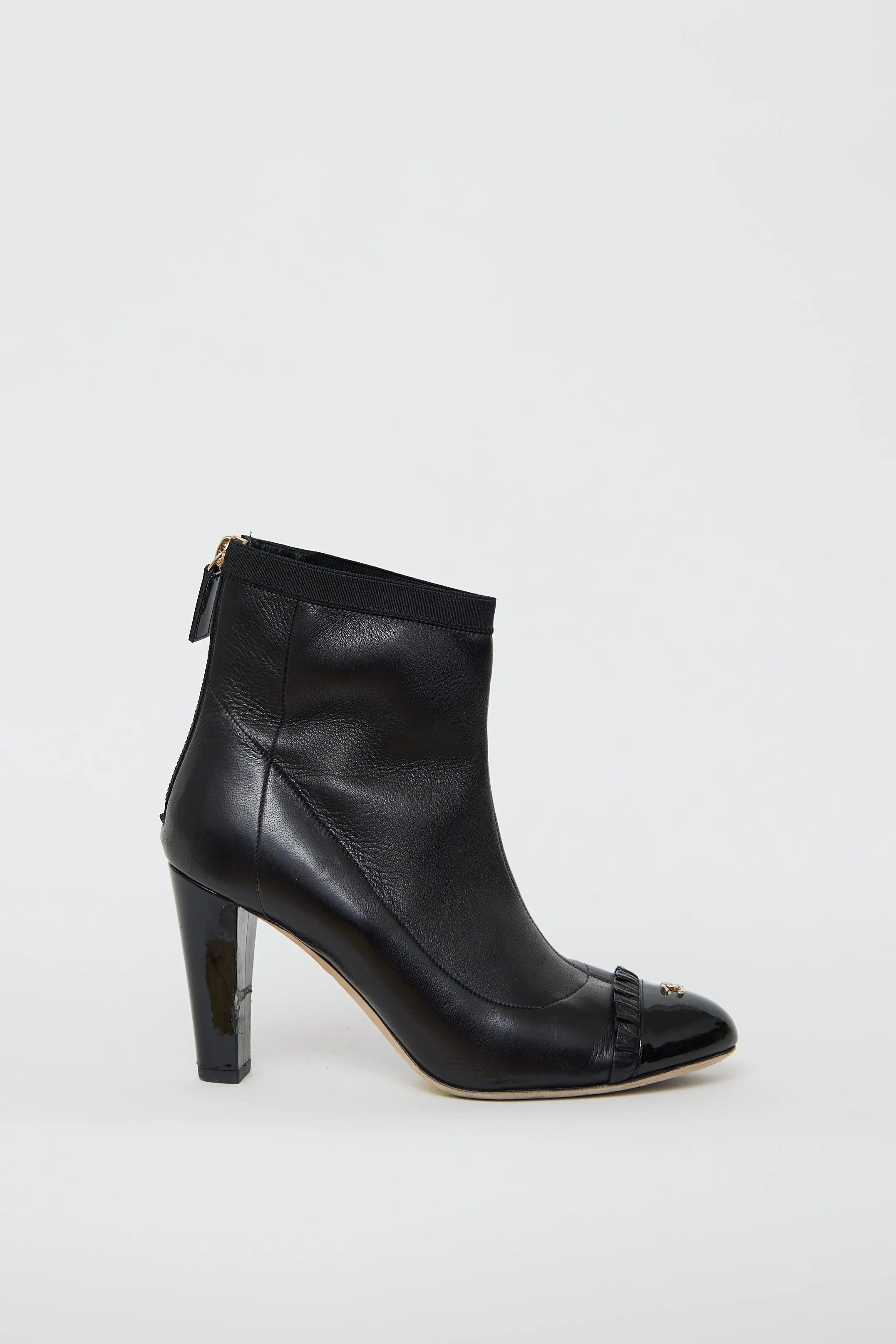 Black Leather Ruffled Ankle Boot